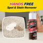 A hand holds a can of Horsepower Bull Shot, an effective carpet cleaner, next to a foam-covered stain on carpet. The text above says, “HANDS FREE Spot & Stain Remover.”.