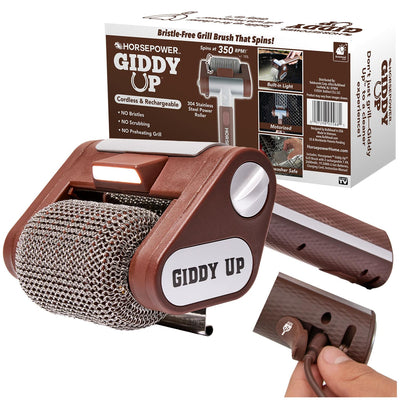 A Horsepower Giddy Up motorized, cordless handheld grill brush with a stainless steel power roller, positioned in front of its product packaging.