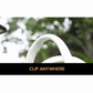 A hand clips a Clip On Outdoor Solar Light (Pack of 2) onto items like a purse, stroller, and shopping cart—showing its versatility. Text reads "CLIP ANYWHERE." Outdoor greenery forms the backdrop.