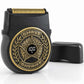 The Shave Sheriff is a compact electric razor featuring a black titanium blade, a gold sheriff badge design, and a digital display showing 100%. It comes with a black protective cap, displayed next to it on a white background.