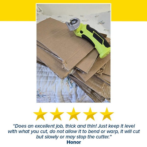 A Cordless Electric Cutter in green and black, equipped with a self-sharpening stainless steel blade, rests on a stack of cardboard pieces atop a bedspread, with a five-star customer review and testimonial shown below the image.