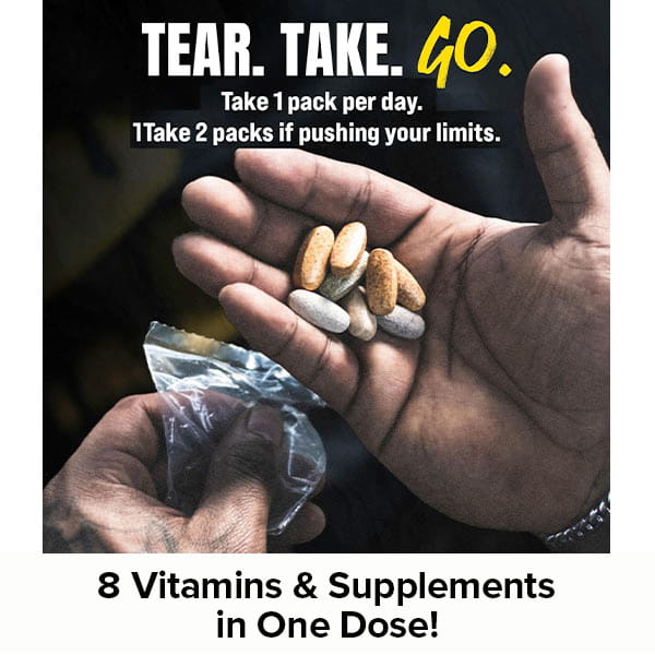 A hand holds several Animal Pak tablets above an open packet, reading TEAR. TAKE. GO. This multivitamin for men & women delivers immune support—take 1 pack daily, or 2 if you’re pushing your limits. 8 supplements in one dose!.