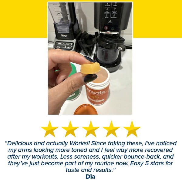 A hand holds a yellow Create Creatine Gummy above its open container. A blender and coffee maker sit behind. Below, a five-star review highlights the great taste and muscle strength benefits of Create Creatine Gummies.