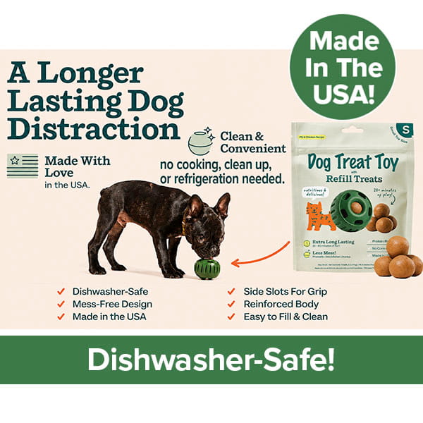 A black dog plays with the Dog Treat Toy With Refill Treats in green. The packaging is shown, highlighting that it is dishwasher-safe, made in the USA, and extra long lasting. Text on the package describes features and convenience, including Long Lasting Dog Chews for hours of satisfaction and Peanut Butter Dog Treats for a flavor your pup will love.
