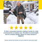 An elderly man wearing a gray Electric Heated Shawl puts mail into a curbside mailbox in a snowy yard.