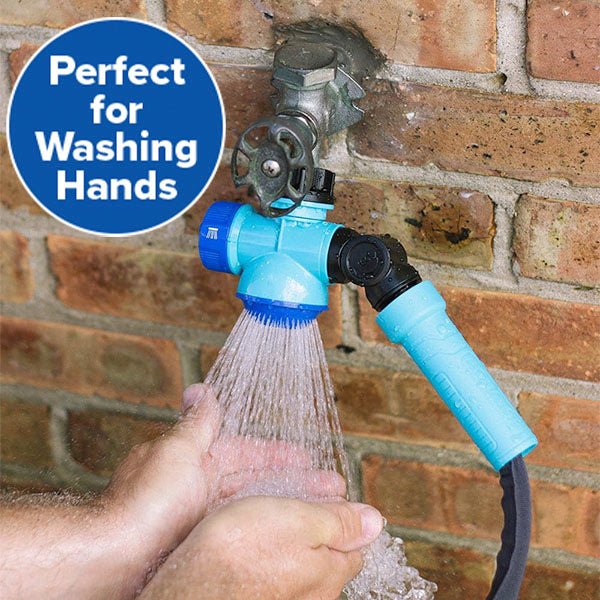 A person washes their hands using the blue Garden Hose Faucet Connector With Tap, attached to an outdoor tap on a brick wall. A circular label reads “Perfect for Washing Hands” as water flows from the connector onto their hands.