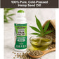 A bottle of Hempvana Original Roll-On is placed beside a bowl of hemp seed oil, a hemp leaf, and scattered hemp seeds on a white surface, with text above highlighting pure, cold-pressed hemp seed oil for soothing pain relief.