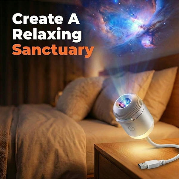 A compact Galaxy Projector Night Light sits on a bedside table, projecting vibrant colors onto the ceiling of a cozy bedroom. Above, text reads: Create a Relaxing Sanctuary.