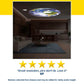 A living room with a ceiling projector displaying an image of Earth, complete with clouds and continents, creates an awe-inspiring atmosphere similar to that of the Galaxy Projector Night Light. Five stars and a positive customer review are shown below the photo.