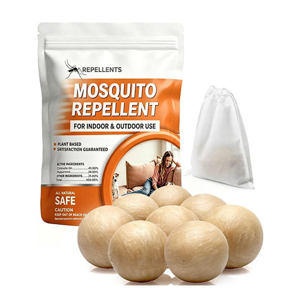 Seven round, beige Mosquito Repellent Balls With Citronella Oil placed in front of a white pouch and a small drawstring bag.