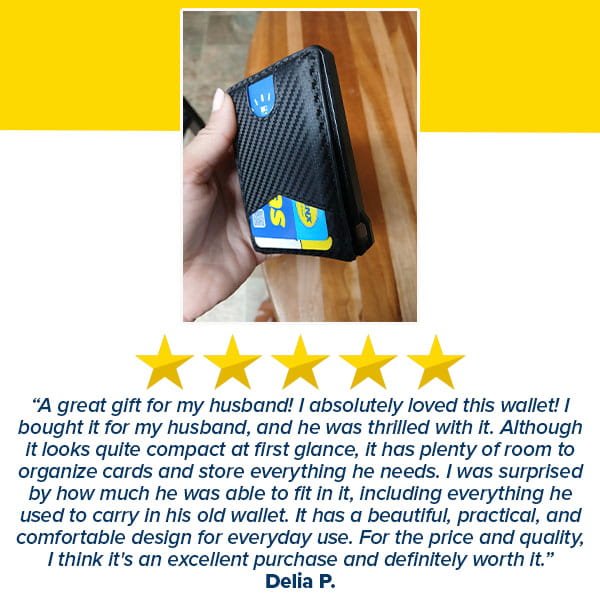 A hand holds the Slim Compact RFID Wallet, a sleek black carbon fiber minimalist wallet with blue and yellow cards visible. Below are five gold stars and a positive customer review by Delia P. on a white background with a wood floor visible.