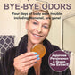 A woman in a robe holds a round, amber-colored Kaori Soap Bar for Old People Smell, with text reading BYE-BYE ODORS and Japanese Persimmon & Green Tea Extract!.