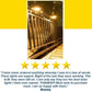 Clip On Outdoor Solar Lights (Pack of 2) brighten a wooden deck railing at night. Below the photo is a five-star rating and a glowing review about the lights’ quality and performance from customer “Brenny.”.