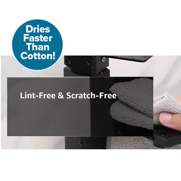 A hand uses a gray Reusable Microfiber Cleaning Towel (pack of 75) to clean a black surface. On the image: "Dries Faster Than Cotton! Lint-Free & Scratch-Free.