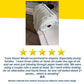A rolled white Reusable Microfiber Cleaning Towel (from the 75-pack) sits on a kitchen counter. Below, A.C.’s five-star review praises these eco-friendly towels for lasting over two weeks in a busy home with three young kids.