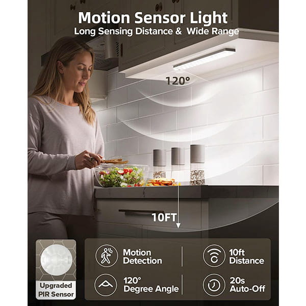 A woman prepares food in a kitchen lit by the 3-Pack Under Cabinet Lighting With Charging Station, featuring motion sensor activation, a 120° detection angle, 10-foot sensing range, and a 20-second auto-off for convenient modern lighting.