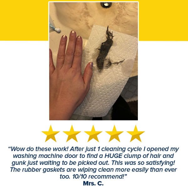A hand holds a paper towel containing a large clump of hair and debris removed by Washing Machine Cleaning Tablets for Pet Owners, shown above a five-star review praising the product’s effectiveness.