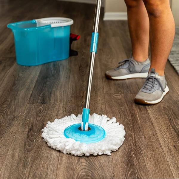 Hurricane Spin Mop in use on a hardwood floor