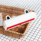 Pet Hair Remover in wicker basket on tile floor