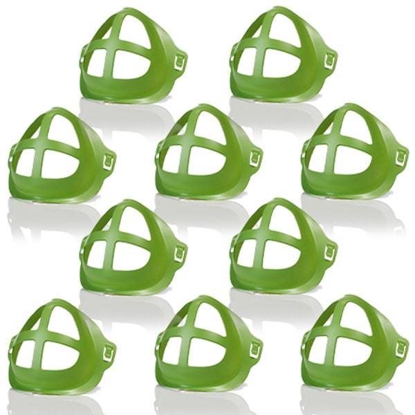 10 green face mask enhancers laid out on a white background