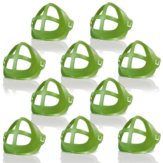 10 green face mask enhancers laid out on a white background