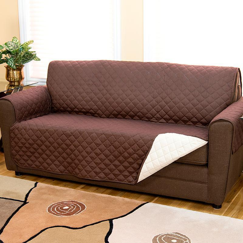 Brown Couch Coat laid on a couch
