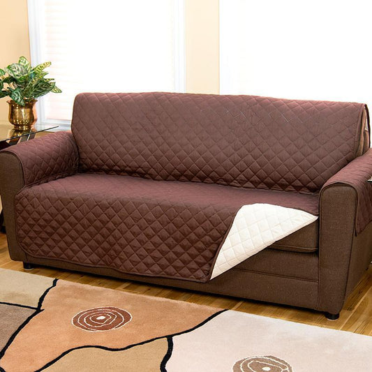 Brown Couch Coat laid on a couch