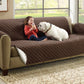 Small girl and dog sitting on a brown Couch Coat laid on a couch