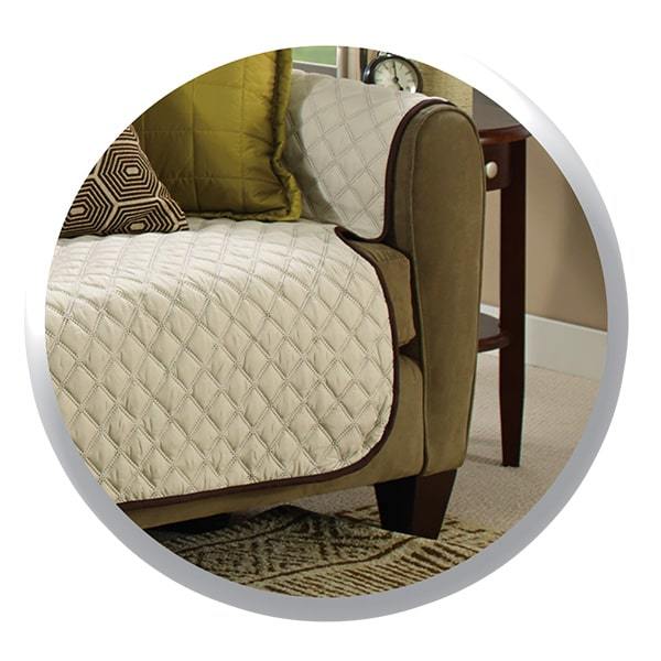 Close up of beige Couch Coat laid on a couch