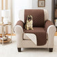 Dog sitting on brown Couch Coat laid on a chair